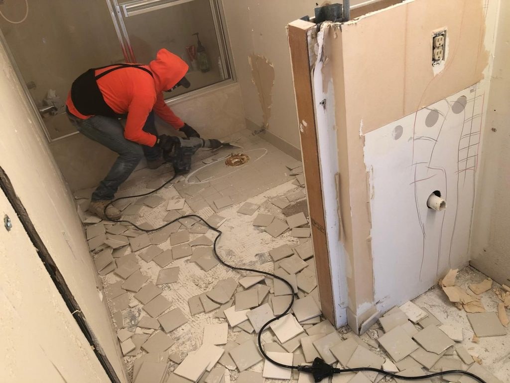 Franky's Drywall craftsman finishing a wall
